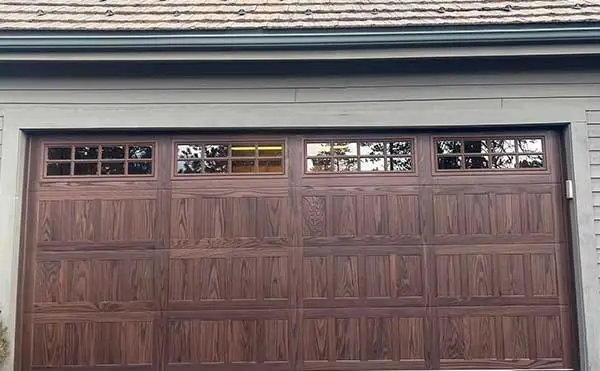 Wooden garage door with top windows