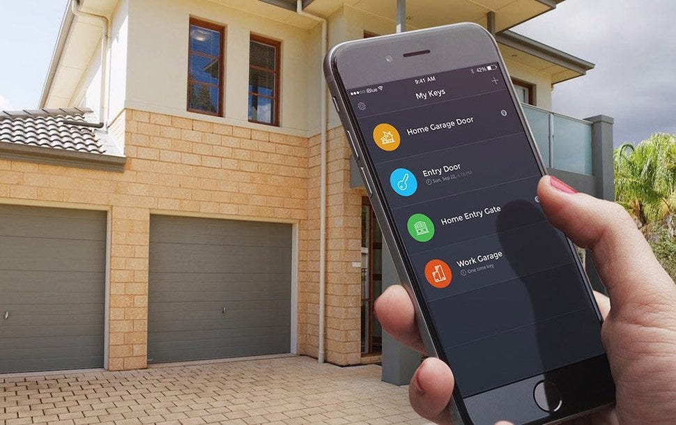 Smartphone controlling home garage doors remotely