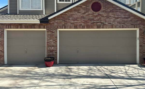 Two-car garage with brick facade