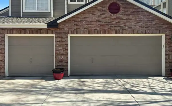 Two-car garage with brick facade