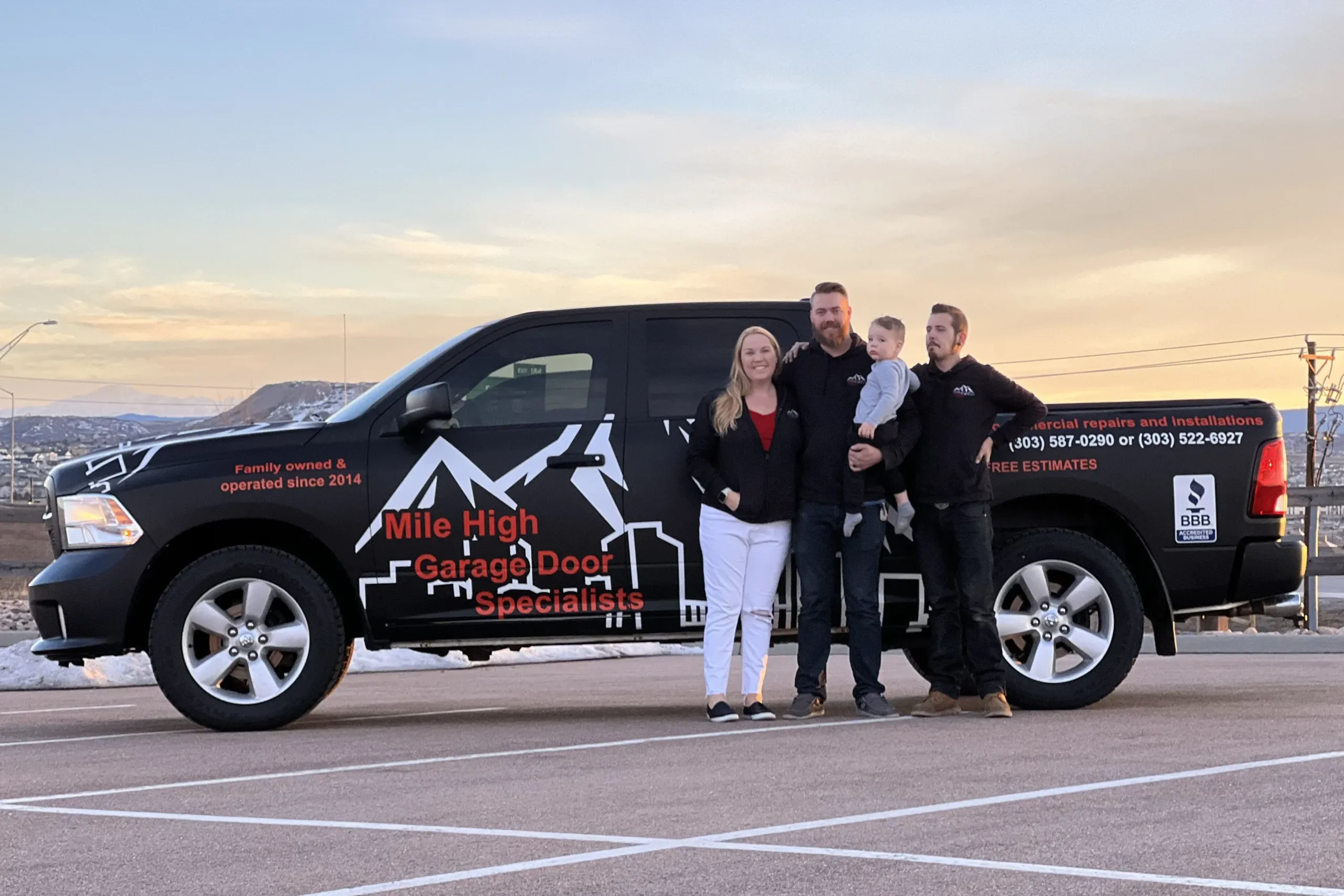Family with Mile High Garage Door truck