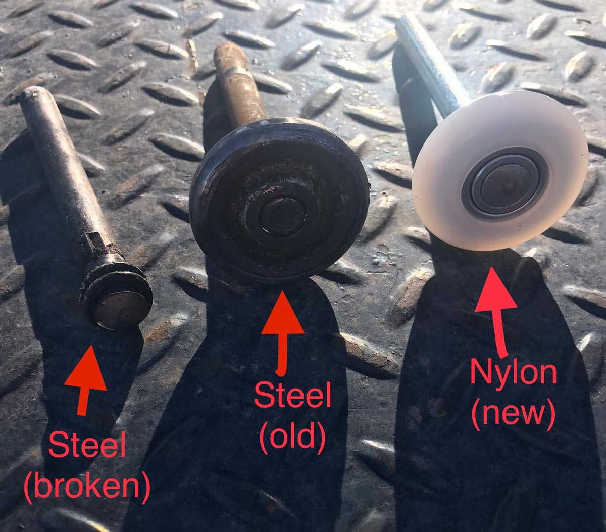 Comparison of broken, old steel and new nylon wheels.